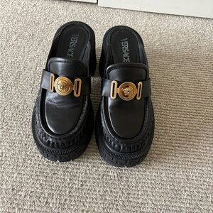 Versace Black Mules with Gold Medallion